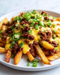 Nachos de Papas Fritas con Carne y Salsa de Queso